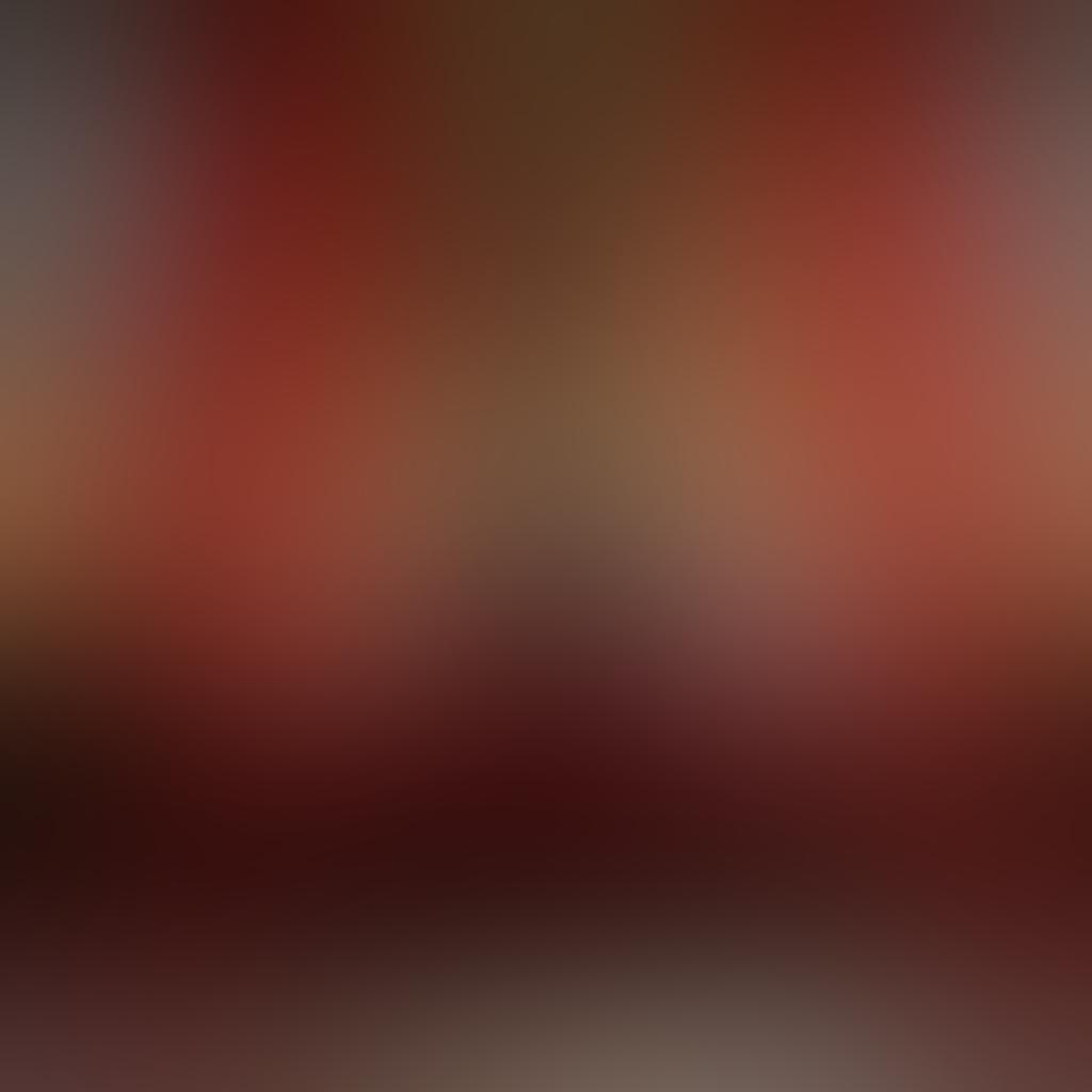 A beautifully lit, intimate setting featuring a soft bed adorned with luxurious velvet sheets, surrounded by flickering candles, creating a warm and inviting atmosphere. Include subtle hints of abstract art on the walls, symbolizing passion and allure. A silhouette of two figures in a tender embrace can be seen through sheer curtains, adding a layer of mystery. The color palette should be warm tones of reds and golds, evoking intimacy and romance. super-realistic. vibrant colors. soft focus.